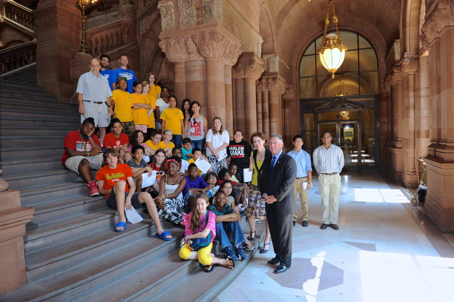 Assemblymembers Fahy and McDonald pictured with Albany Police Athletic League’s Summer Camp at the Million Dollar staircase in the Capitol.