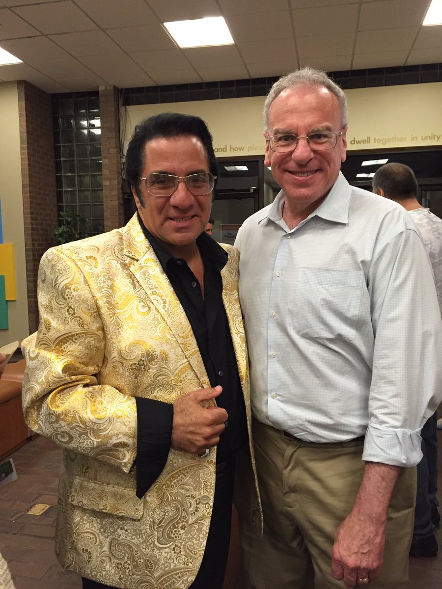Gene DiNapoli donned his best Elvis impersonation and paused his set to take a photo with Assemblyman Dinowitz.