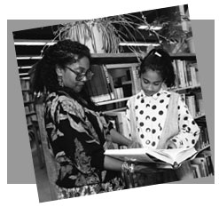 woman and girl in library