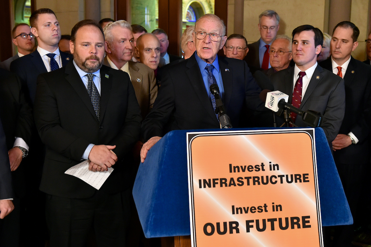 Assemblyman Dave McDonough [at podium] speaks at today’s infrastructure investment press conference