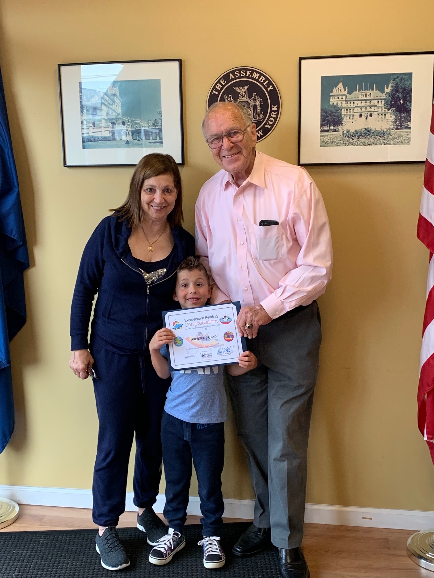 Assemblyman Dave McDonough (R,C,I-Merrick) pictured with Michael Grosso [center] and his Grandmother Angela Curro [left] with Michael’s Summer Reading certificate.