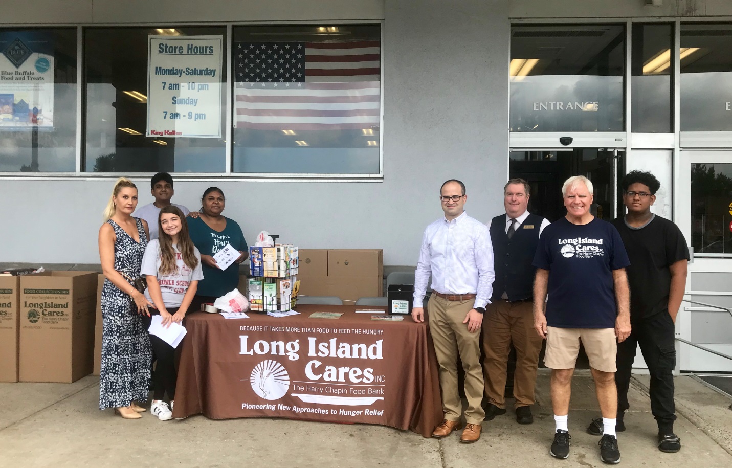 (From left to right) Volunteers Suren Aromogan (back), Meena Armogan (back), Nuria Angos (front), Sofia Carter (front), Assemblyman Ed Ra (R-Franklin Square), Bud Stengren, King Kullen store manager,