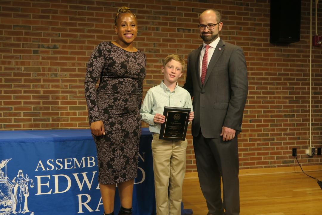 Assemblyman Ed Ra (R,C,I-Franklin Square) pictured with contest winner Will Brennan from Stratford Avenue School in Garden City. The second photo features Ra, Brennan and Karen Cummings from LiveOnNY.