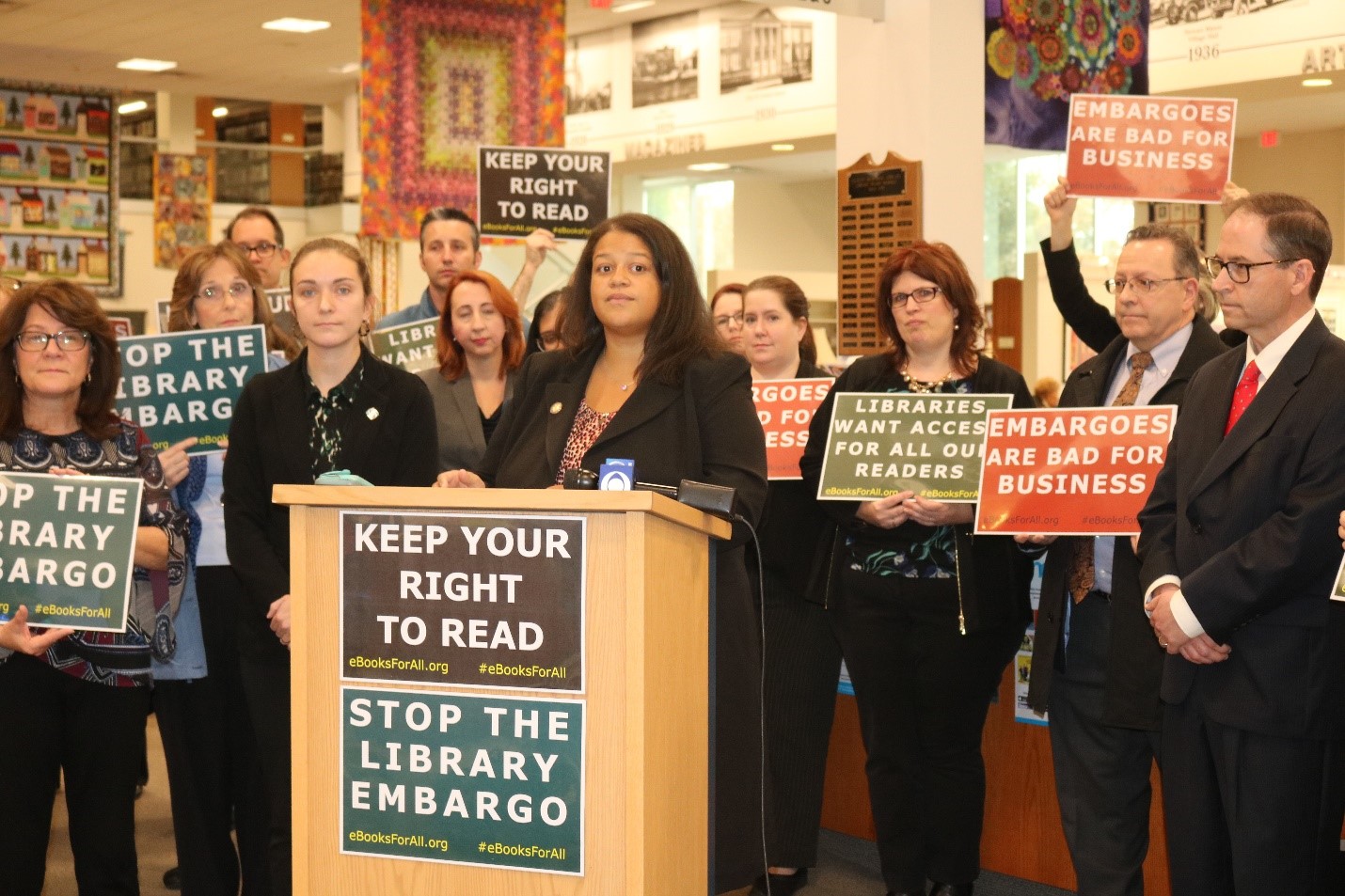 Assemblywoman Solages leads a rally with librarian and advocates to push Macmillan to end their e-book embargo.