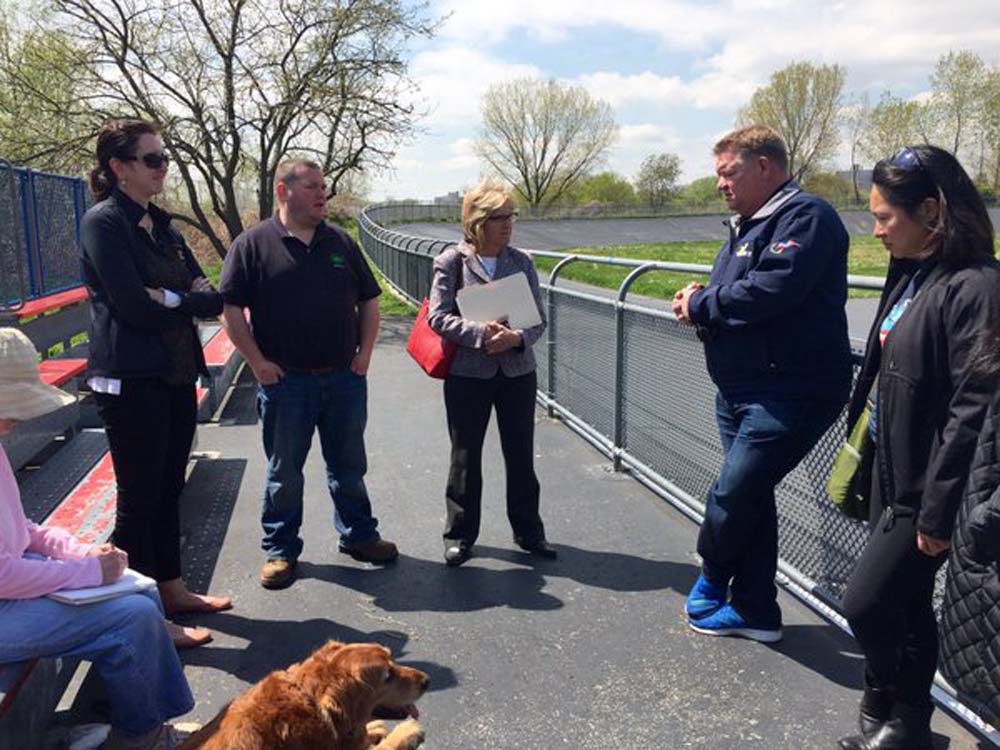 Assemblywoman Nily Rozic and local residents discussed community concerns during a neighborhood walkthrough with City Parks Queens Borough Commissioner Dottie Lewandowski.