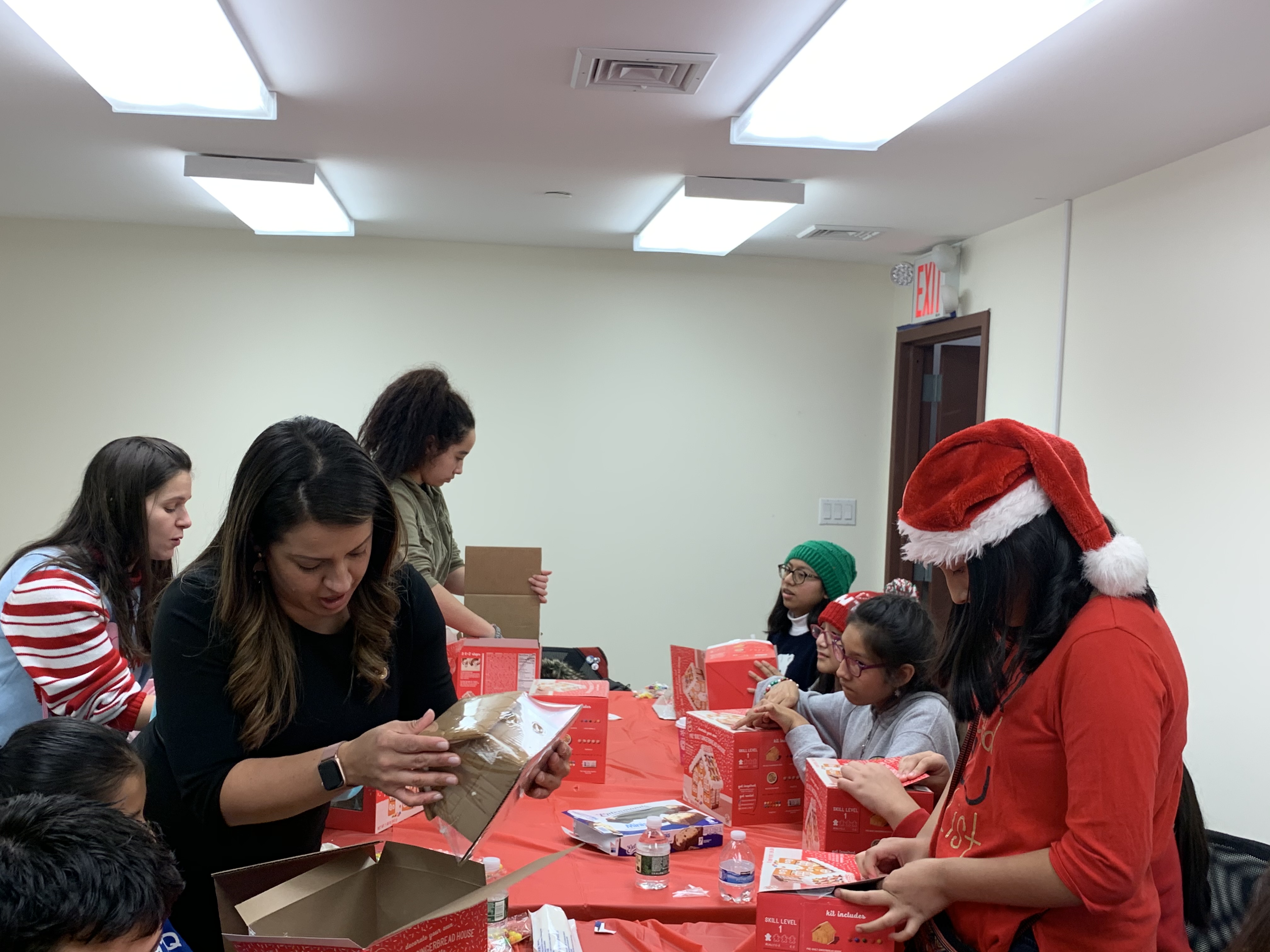 In partnership with Together We Can, Assemblywoman Cruz hosted youth in the office to build gingerbread houses.