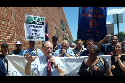 Assemblyman Colton is seen here leading a rally to restore the B64 bus.  He was joined by members of the community and TWU Local 100.