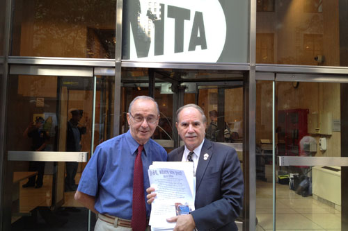 Assemblyman Colton is seen here with Bath Beach resident Mario D'Elia, delivering B64 petitions to an MTA Board meeting.
