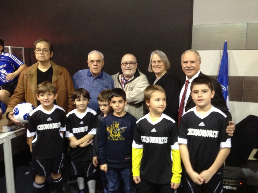 Assemblymembers Helene Weinstein and William Colton celebrate with Chermomorets youth soccer teams.