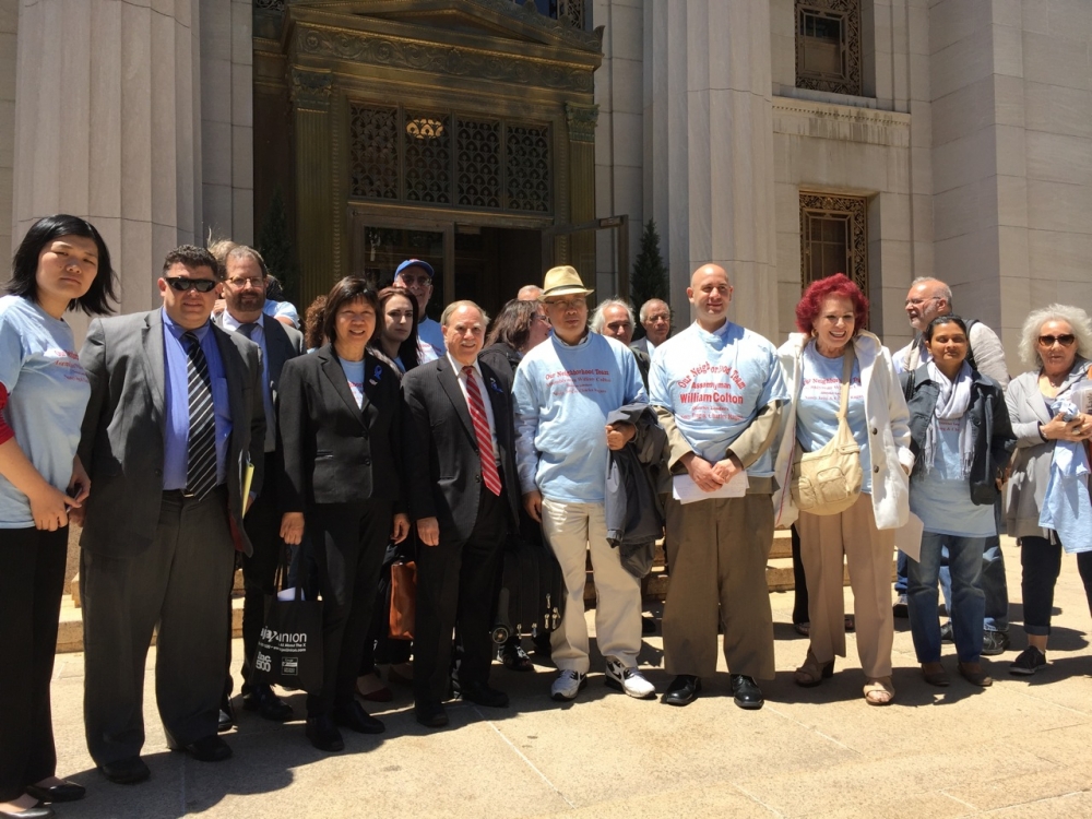 Assemblymember William Colton with pro bono co-counsel Chris Robles, Chief of Staff Susan Zhuang, Community Relations director Nancy Tong  and community leaders outside the Appellate Division Courthou