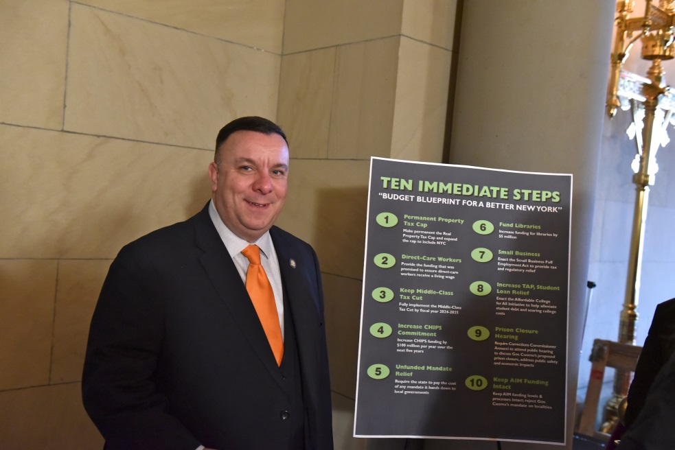 Assemblyman Brabenec poses with the Assembly Minority’s ‘Budget Blueprint for a Better NY’
