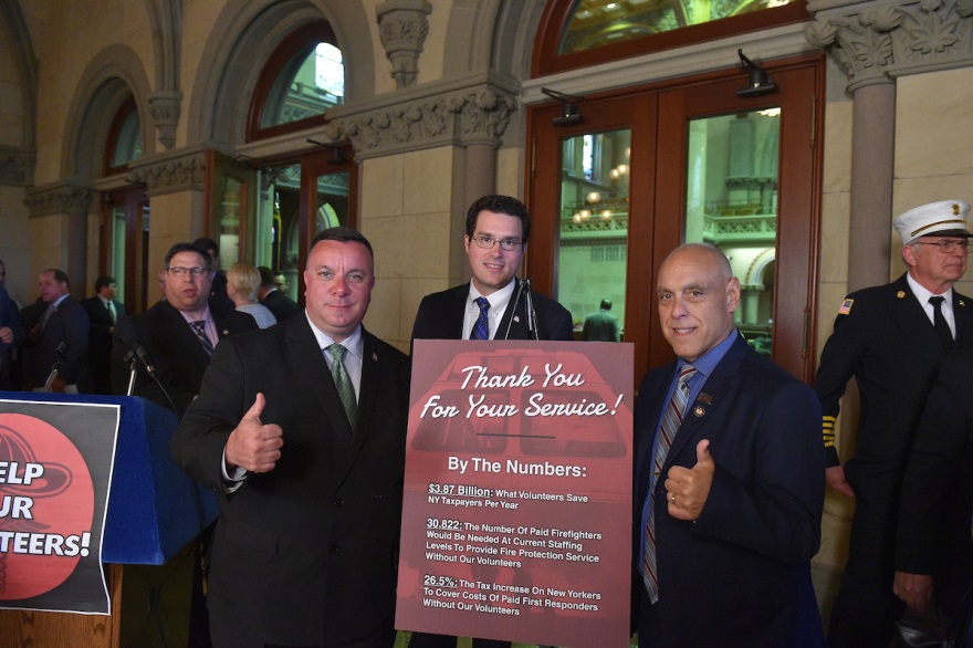 Assemblyman Karl Brabenec (R,C,I-Deerpark) [left] attended a press conference in Albany pushing a tax exemption for volunteer first responders on Monday, May 20, 2019.
