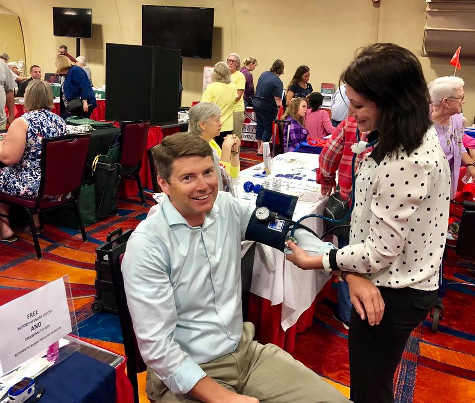 Assemblyman Billy Jones gets his blood pressure checked at Seniorama, an event put on the North Country Chapter of the Statewide Senior-Action Council. This free event each year brings North Country S