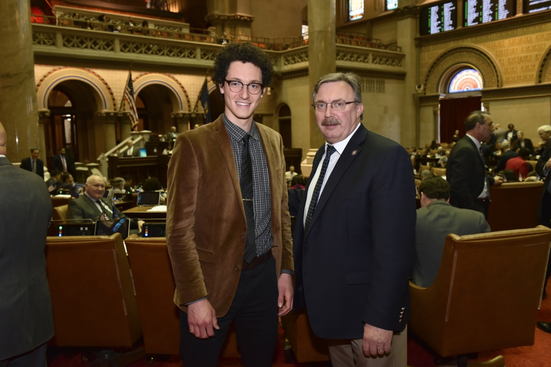 Assemblyman Brian Miller (left) poses with his 2019 Legislative Intern, Michael Howard, from Clinton, New York in the State Assembly Chamber in Albany on May 8, 2019.