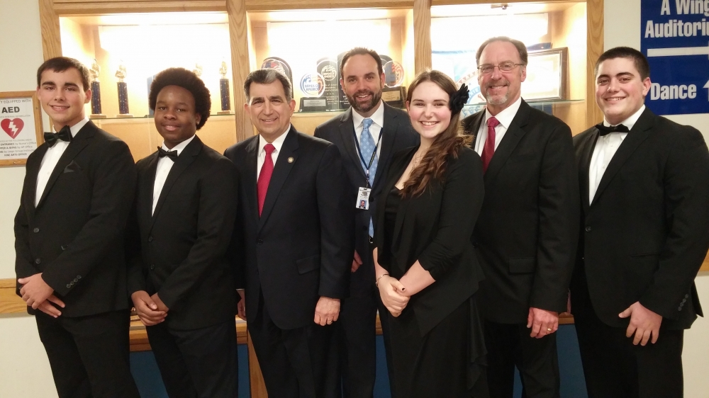 Assemblyman Magnarelli, Superintendent Dr. Chris Brown, and Director of Fine Arts Bill Davern posed with high school band members prior to the concert.