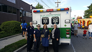 National Night Out heightens crime and drug prevention awareness and strengthens neighborhood spirit and police-community partnerships. Assemblywoman Helene Weinstein, a sponsor of this year's event, spoke to 63rd Precinct Captain, Thomas W. Burke, ab