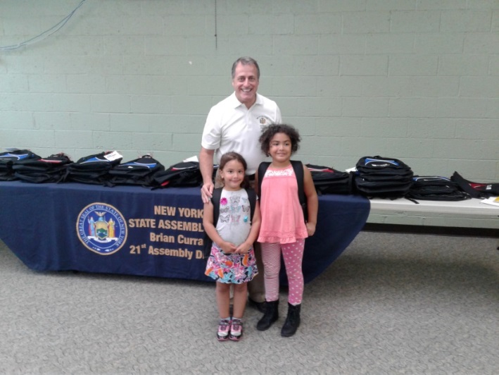Assemblyman Brian Curran partnered with Green Acres Mall to give away 50 backpacks and school supplies to Baldwin families.