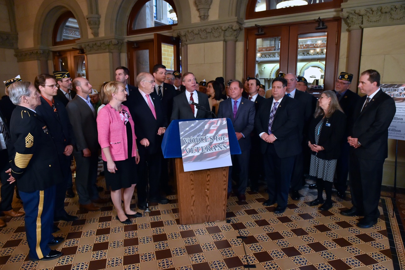Assemblyman Christopher S. Friend (R,C,I-Big Flats) (second to left) joined veterans and Assembly Minority colleagues in calling for the restoration of $6 million in funding for veterans programs. Assembly Minority Leader Will Barclay is speaking (center)