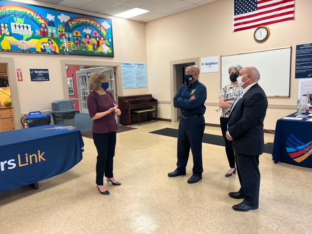 Pictured in the third photo with Speaker Heastie at Neighbors Link is (from left to right) Executive Director Carola Braco, Board of Directors Chair Elisa Burns and Assemblymember Burdick.