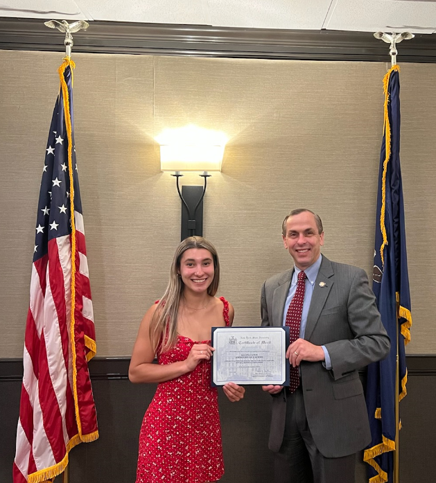 Assemblyman Robert Smullen [right] presents Johnstown High School Senior Kalena Eaton with a Certificate of Merit for receiving two college scholarships with intent to combat drunk and drugged driving on Monday, June 20.